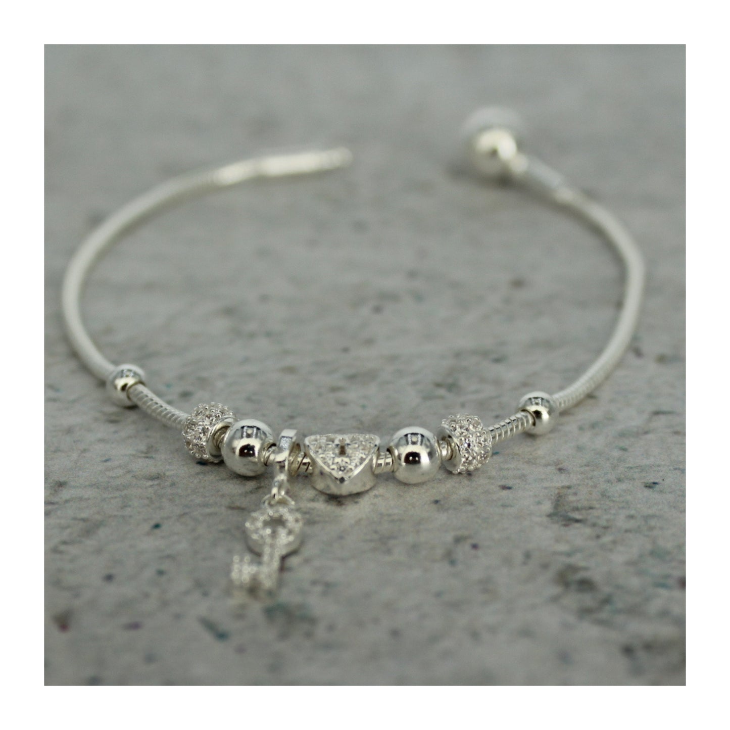 Pulsera de plata .925 Corazón & Llave “Amor Eterno” con zirconias brillantes