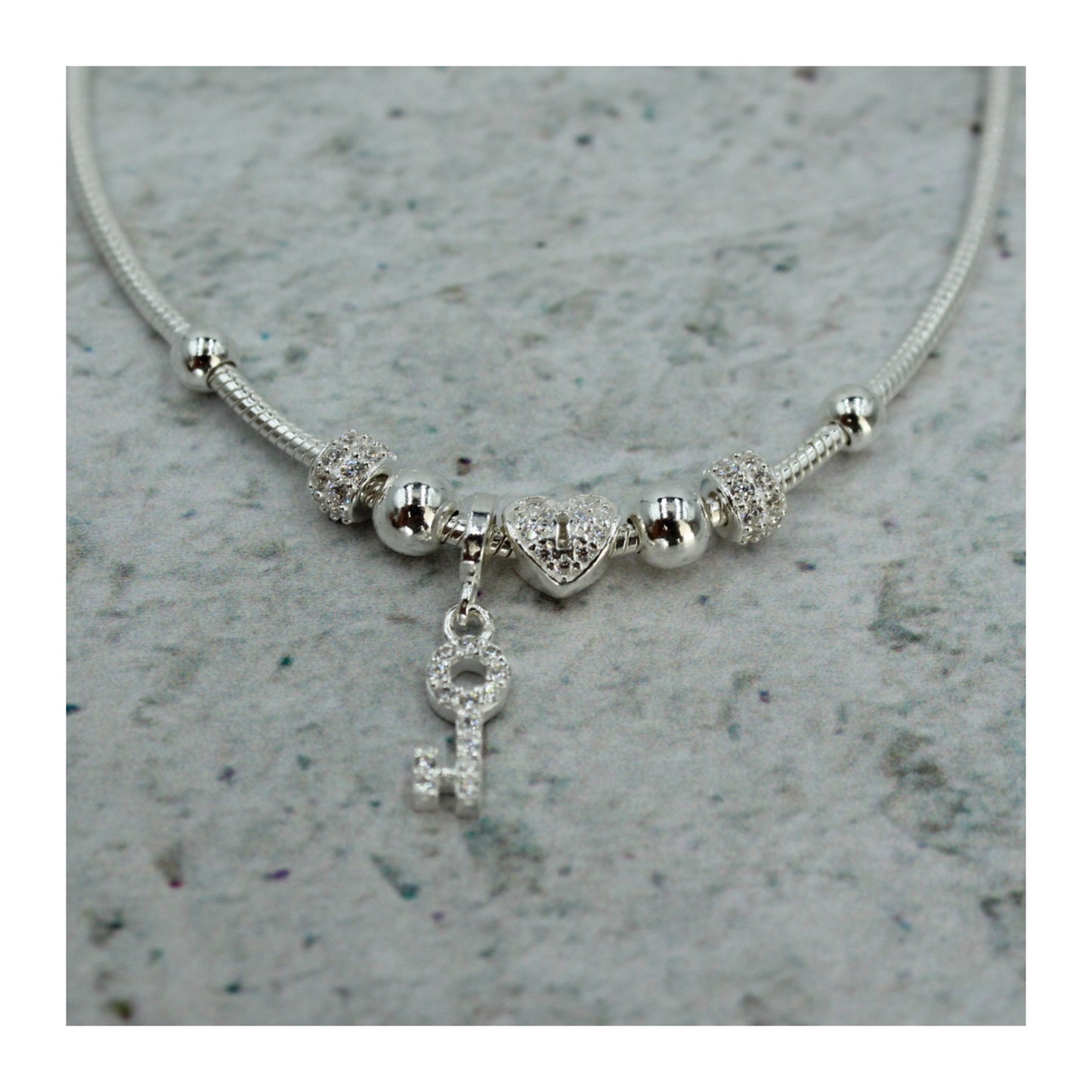 Pulsera de plata .925 Corazón & Llave “Amor Eterno” con zirconias brillantes