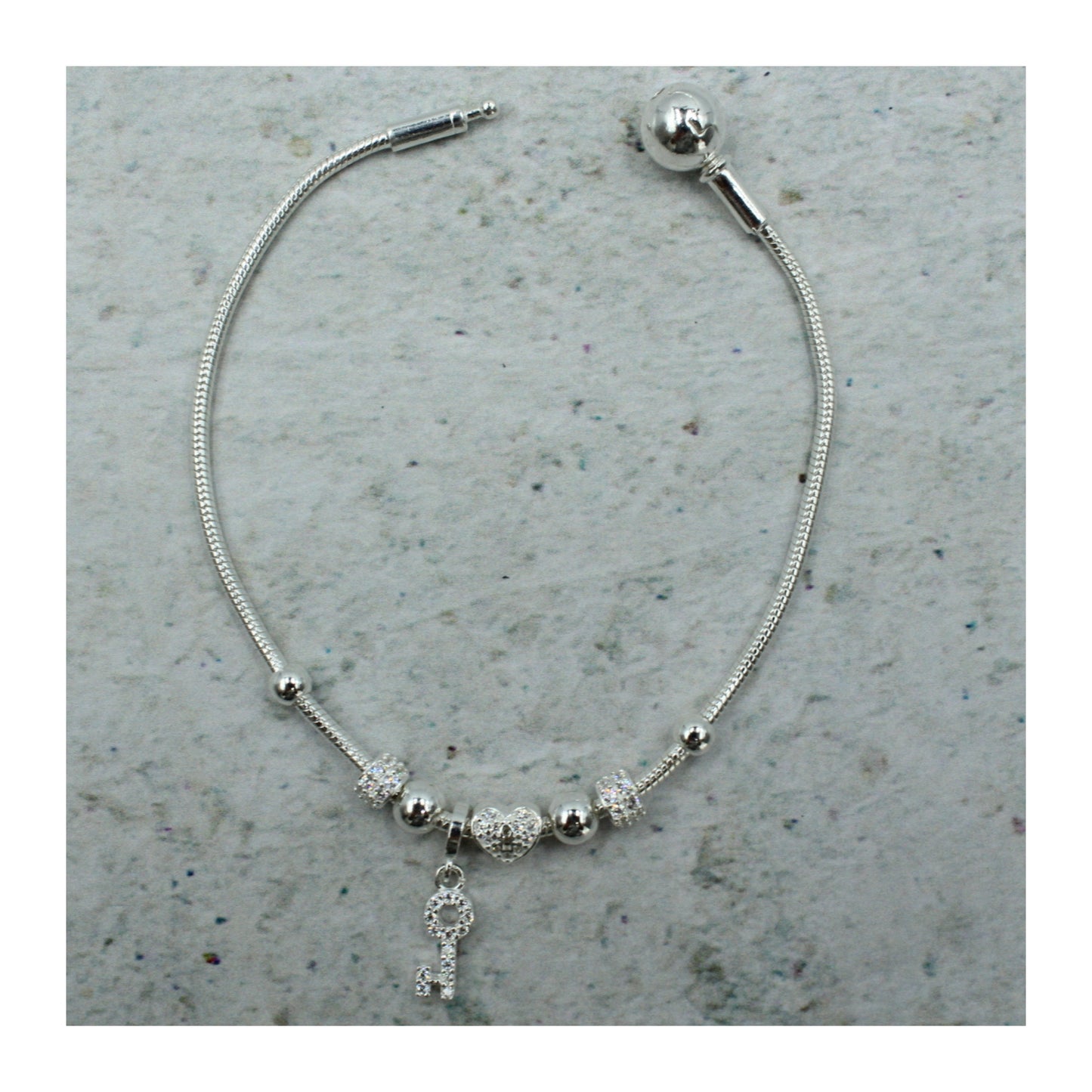 Pulsera de plata .925 Corazón & Llave “Amor Eterno” con zirconias brillantes